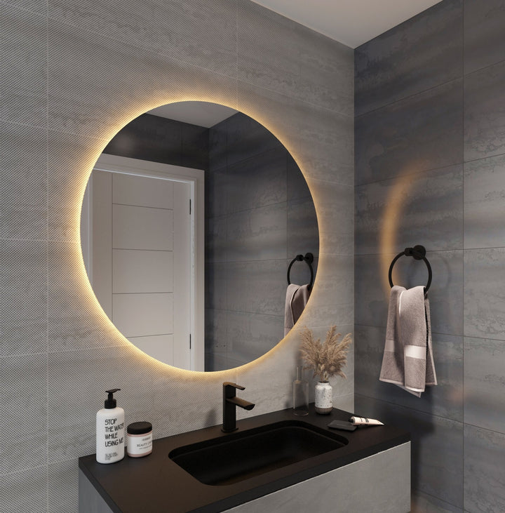 Lumixe Circo Round Frameless LED Mirror, in a bathroom setting